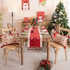 Festive Christmas table runner set with reindeer jacquard, placemats and holiday pillows
