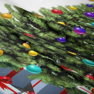 Close-up of bohemian Christmas tapestry fabric showing detailed pine and ornament print