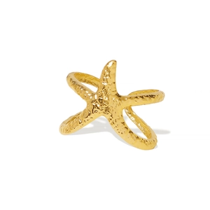 Textured gold starfish ring in stainless steel with hammered finish on white background