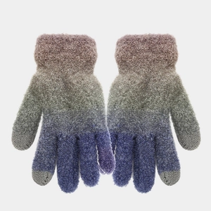 Detail of tie-dye knit gloves with touch screen fingertips and soft texture