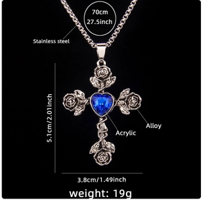 Detail view of cross pendant with roses and blue heart gem with size and material labels