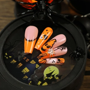 Halloween press on nails set with pumpkin ghost patterns and 3D spider rhinestone detail