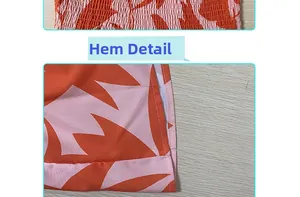 Detail of smocked waist and hem on sleeveless backless dress with orange floral print