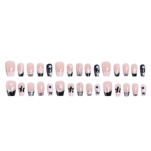 Pink and black star pattern press-on nails with rhinestones and french stripes