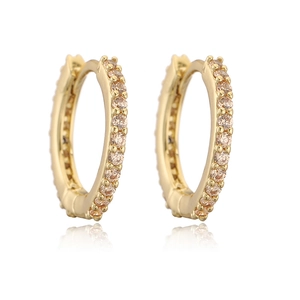 Minimalist gold hoop earrings with champagne zircon stones and a polished finish