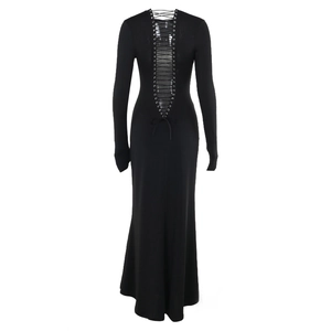 Detail of black floor-length dress showing lace-up open back and metal eyelets