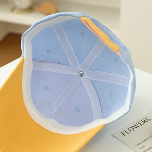 Inside view of lightweight cotton kid's baseball cap with sweatband and six-panel stitching