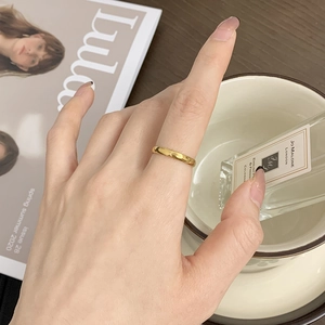 Minimalist 18K gold plated star moon ring worn on hand in an elegant lifestyle setting