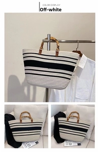 Detail of woven tote bag featuring bamboo handles and stylish striped cotton texture