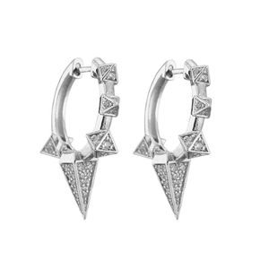 Macro shot of silver spike hoop earrings with micro-pave cubic zirconia accents