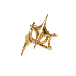 Minimalist gold star shaped stainless steel open ring shown in a clean flat lay view