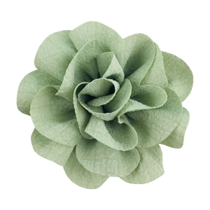 Detail of 7cm sage green bubble crepe handmade fabric flower with layered cotton texture