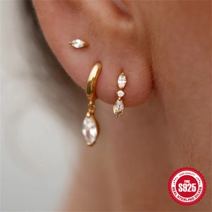 Elegant 925 sterling silver earring set with gold plating and marquise cut cubic zirconia
