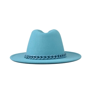 Macro shot of turquoise fedora hat with matching chunky plastic chain detail