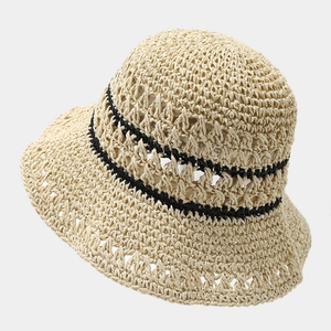 Women's hollow weave wide brim straw hat with decorative black wave lines for sun protection