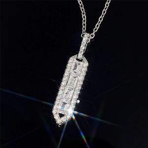 Luxury geometric vertical bar pendant necklace with emerald cut crystals in silver