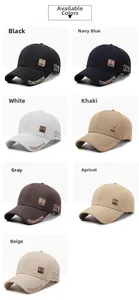 Detail view of cotton baseball caps in multiple colors featuring front letter embroidery