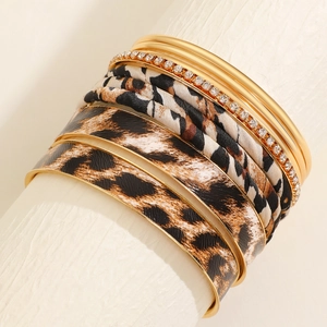 Detail of multi-layer leopard print leather bracelet set with sparkling rhinestones