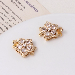 Detail of gold peach flower clasp with micro-set zircon for pearl bracelet DIY projects