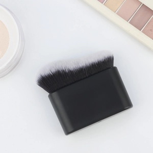 Detail showing the wavy bristle design of the flat contour brush and its dual-tone fiber