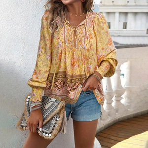 Bohemian floral long sleeve shirt in yellow with a stylish tassel clutch bag
