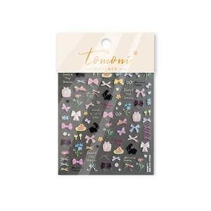 Cute 3D nail art stickers with black rabbits, colorful bows, and floral designs