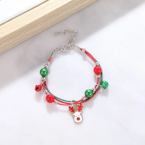 Close-up of adjustable Christmas bracelet with reindeer charm and colorful jingle bells
