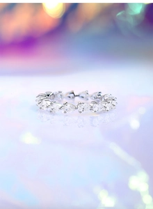 Macro detail of S925 silver eternity ring featuring pear-cut zircon stones and full pavé setting