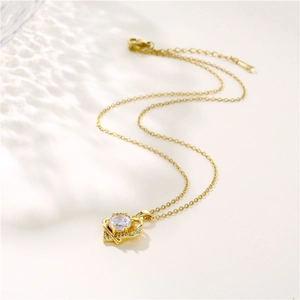 Golden heart pendant necklace with round white zircon in-laid on stainless steel chain