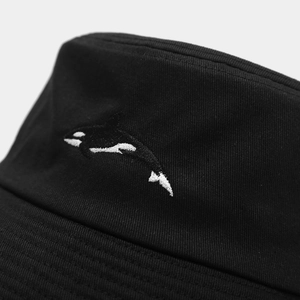 Black canvas bucket hat with detailed orca whale embroidery for sun protection