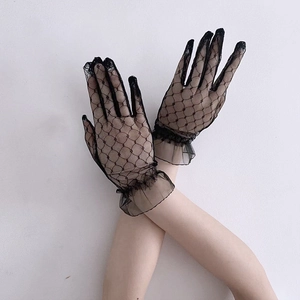 Detailed view of elegant black lace mesh gloves for Halloween costumes and parties