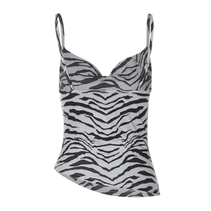 Detailed view of the zebra print camisole top featuring thin straps and cowl neckline