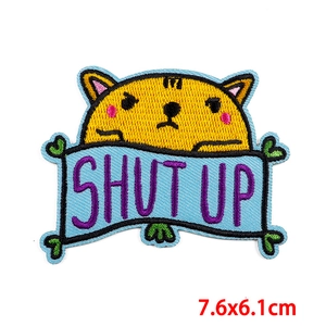 Detail of yellow cat embroidery patch with SHUT UP text, size 7.6x6.1cm for clothing decor