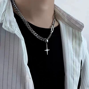 Unisex silver stainless steel cuban chain necklace with star pendant on model