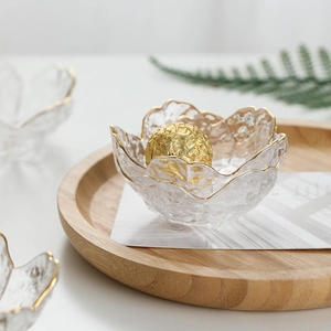 Cherry blossom glass sauce dish with gold rim and transparent petal shape design