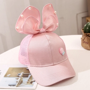 Detail of pink girls baseball cap with pearl bow, mesh back and lollipop accent