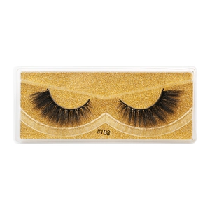 Detailed close-up of 3D faux mink eyelashes style #108 in clear case with gold glitter card