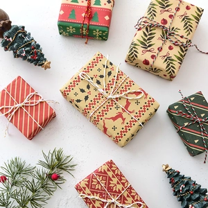 Three-piece Christmas gift box set with festive patterns and reindeer for tree decoration