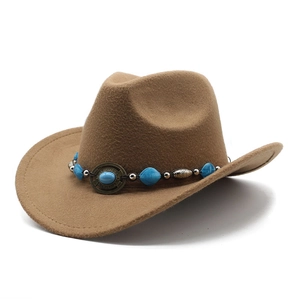 Vintage brown felt cowboy hat with blue turquoise beads and ethnic metal decorations