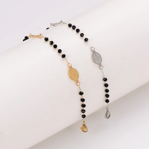 Rosary-style stainless steel bracelets with black faceted beads and St. Benedict medals