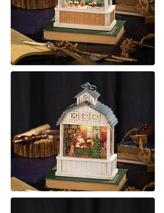 Gros plan sur une boule à neige de Noël en bois avec Père Noël et décor enneigé