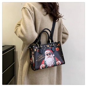 Detail of Santa Claus print black PU leather tote bag with Merry Christmas strap