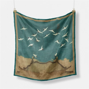 Detail of oil painting silk scarf featuring flying cranes and ancient architecture
