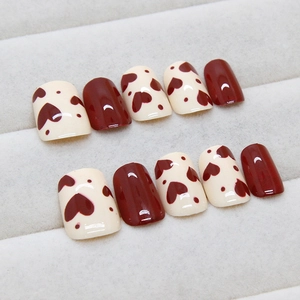 Handmade short square press-on nails in deep red and cream white heart dot pattern