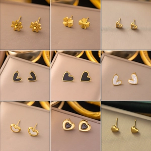 Collection of gold titanium steel earrings with pearls, hearts and floral patterns