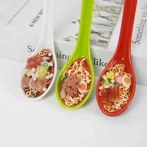 Realistic miniature beef ramen noodle model in colorful spoons for collection or decor