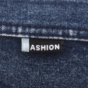 Deep blue denim newsboy cap for men featuring stylish patchwork and woven label detail