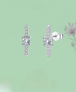 Macro shot of S925 sterling silver geometric earrings with square-cut zircon stones