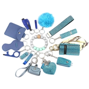 14-piece turquoise rhinestone safety keychain set with alarm and plush puff for women