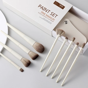 Professional 8-piece beige makeup brush set with storage case and premium packaging box